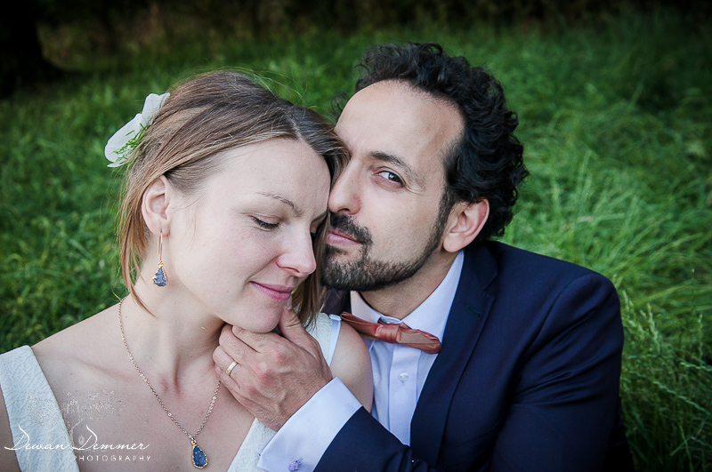 London Wedding Photography of Bride and Groom on the grass in Clissold Park close to Finsbury Park